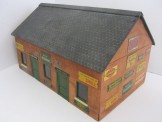 Very Rare Bassett-Lowke or Similar Gauge One Wood Construction Goods Shed fitted with Tinplate Advertising Signs