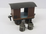 Very Early Marklin Gauge One Hand Enamelled Milk Wagon containing 2 Milk Churns