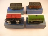4 x Hornby Dublo Tinplate Wagons.  NE and LMS Coal Wagons, NE Fish and ''Power Petrol''.  All Boxed