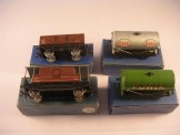 4 x Hornby Dublo Tinplate Wagons.  LMS Open, Silver ''Esso'', LMS Brake Van and ''Power Petrol''.  All Boxed
