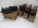 Marklin Gauge 0 4 Volt Electric LNER 0-4-0 Locomotive & Tender.  Together with three matching LNER teak bogie coaches, all boxed.