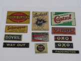 12 x Bassett-Lowke Tinplate Advertising Signs