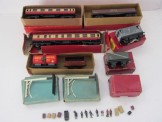 Quantity of Trix Accessories including Rolling Stock, Station Figures, Many Ways Station.  Boxed and loose track etc.